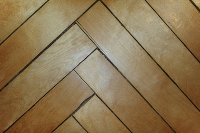 swollen and buckling floor due to water damange